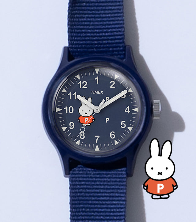 TW6A31000 Pop & Miffy by Timex MK1 watch with a navy fabric strap and Miffy dial, beside a Miffy illustration.