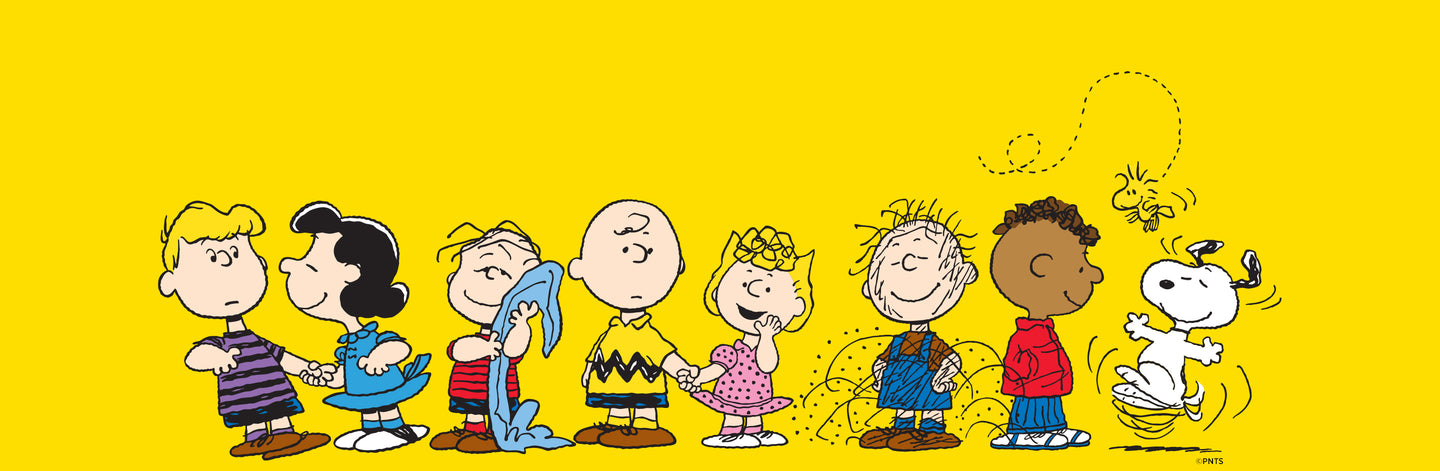 The entire peanuts gang smiling on a yellow and blue background