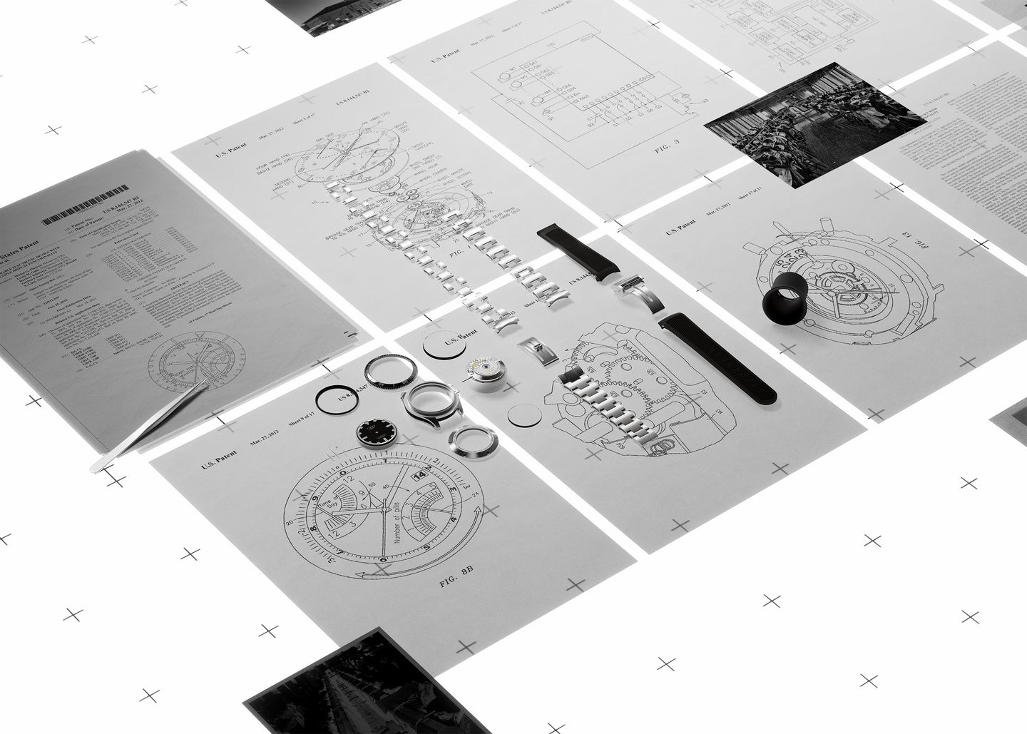 Timex watch design workspace featuring patent documents, technical watch schematics, archival photographs, and disassembled watch components displayed on a light table to showcase innovation and craftsmanship.