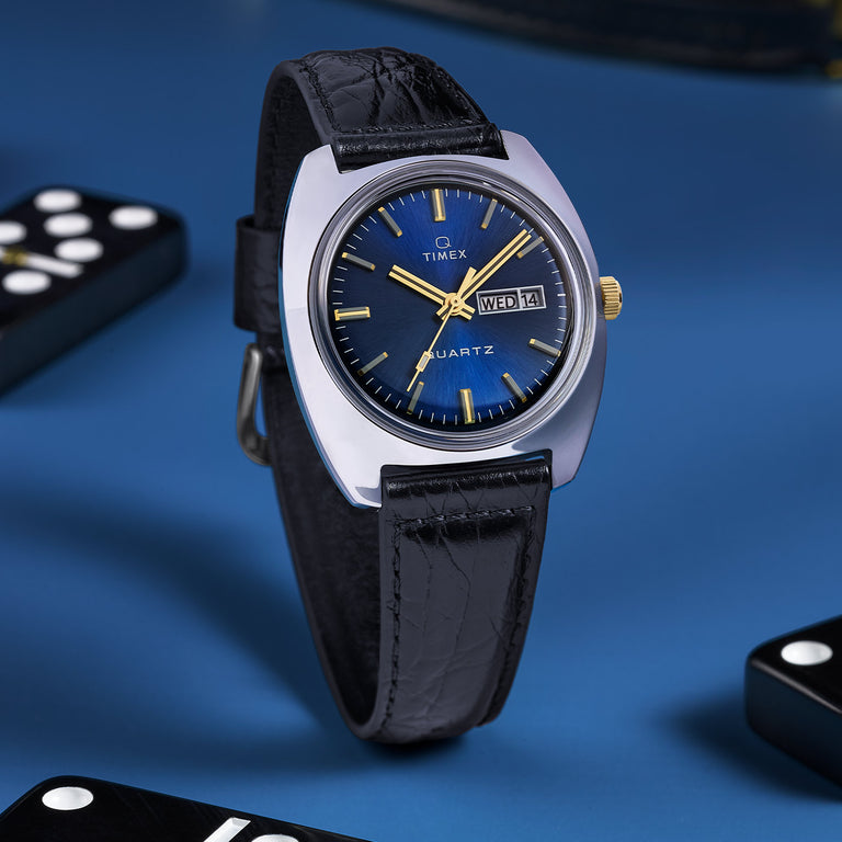 1978 Reissue with blue dial against a blue background with dominos