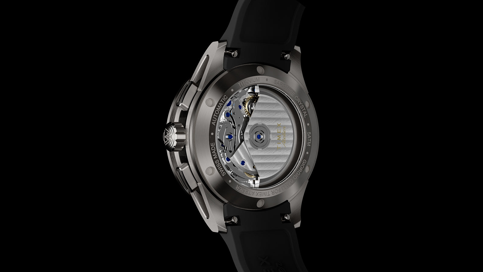 Exhibition caseback of the Timex Atelier Chronograph Automatic M1a Ti revealing the Swiss-made automatic movement through a sapphire crystal display back.