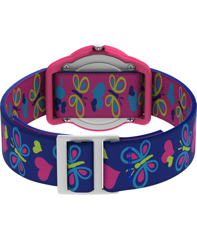 T89001 TIMEX TIME MACHINES® Reloj infantil de 29 mm con mariposas y corazones, de tejido elástico azul. Imagen del fondo de la caja con accesorio.