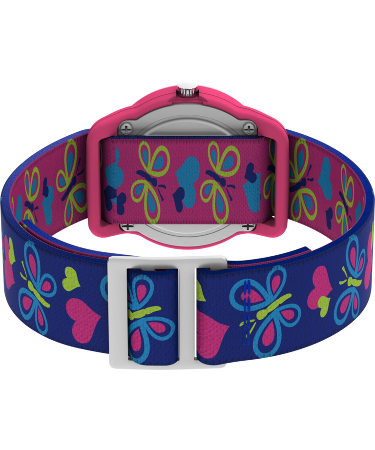 T89001 TIMEX TIME MACHINES® Reloj infantil de 29 mm con mariposas y corazones, de tejido elástico azul. Imagen del fondo de la caja con accesorio.