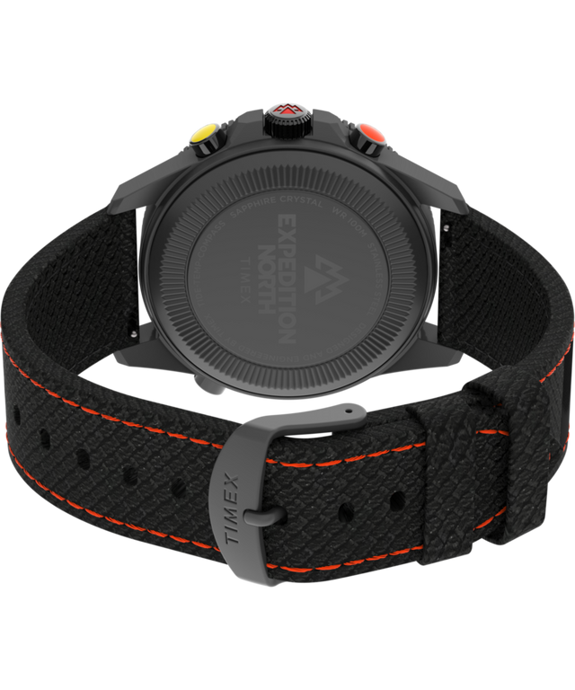 TW2V03900 Reloj Expedition con indicador de marea, temperatura y brújula, de 43 mm, con correa de tejido ecológico. Imagen del fondo de la caja con accesorio.