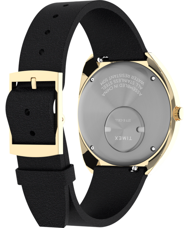 TW2V25400 Q Timex, reedición de 1972, reloj de 39 mm con correa de piel: imagen del fondo de la caja con accesorio