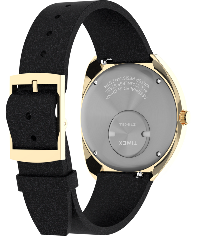 TW2V25400 Q Timex, reedición de 1972, reloj de 39 mm con correa de piel: imagen del fondo de la caja con accesorio