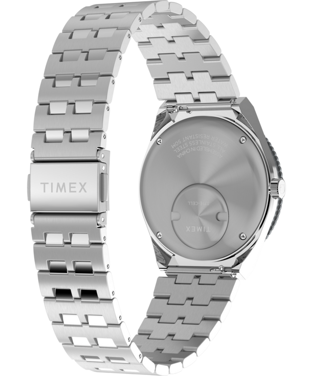 TW2V38000 Q Timex GMT, reloj de 38 mm con brazalete de acero inoxidable: imagen del fondo de la caja con accesorio