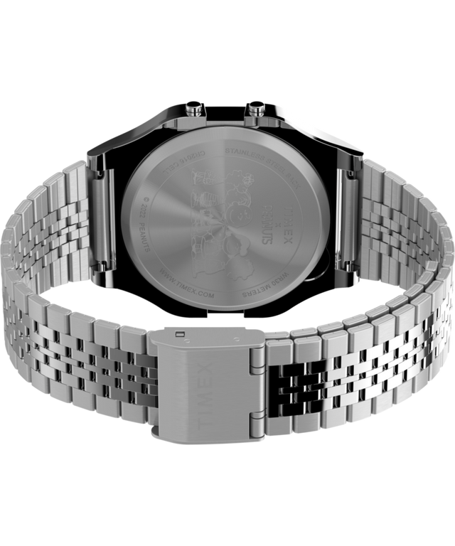TW2V61300 Peanuts® x Timex 80 Dream in Color, reloj de 34 mm con brazalete de acero inoxidable: imagen del fondo de la caja con accesorio