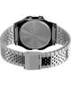 TW2V61300 Peanuts® x Timex 80 Dream in Color, reloj de 34 mm con brazalete de acero inoxidable: imagen del fondo de la caja con accesorio