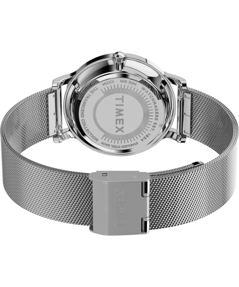 TW2W19100: Imagen del fondo de la caja del reloj Transcend con brazalete de malla de 34 mm y accesorio
