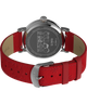 TW2W44400 Peanuts® x Timex Standard Snoopy Santa, reloj de 40 mm con correa de piel: imagen del fondo de la caja con accesorio
