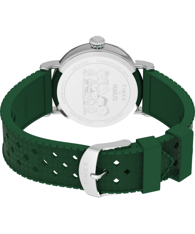 TW2W78900 Reloj Peanuts® x Timex Standard Golf de 40 mm con correa de caucho sintético  Imagen del fondo de la caja con accesorio