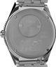 TW2W83300 Peanuts® x Q Timex® GMT, reloj de 38 mm con brazalete de acero inoxidable. Imagen del fondo de la caja.