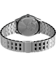 TW2W83300 Peanuts® x Q Timex® GMT, reloj de 38 mm con brazalete de acero inoxidable: imagen del fondo de la caja con accesorio