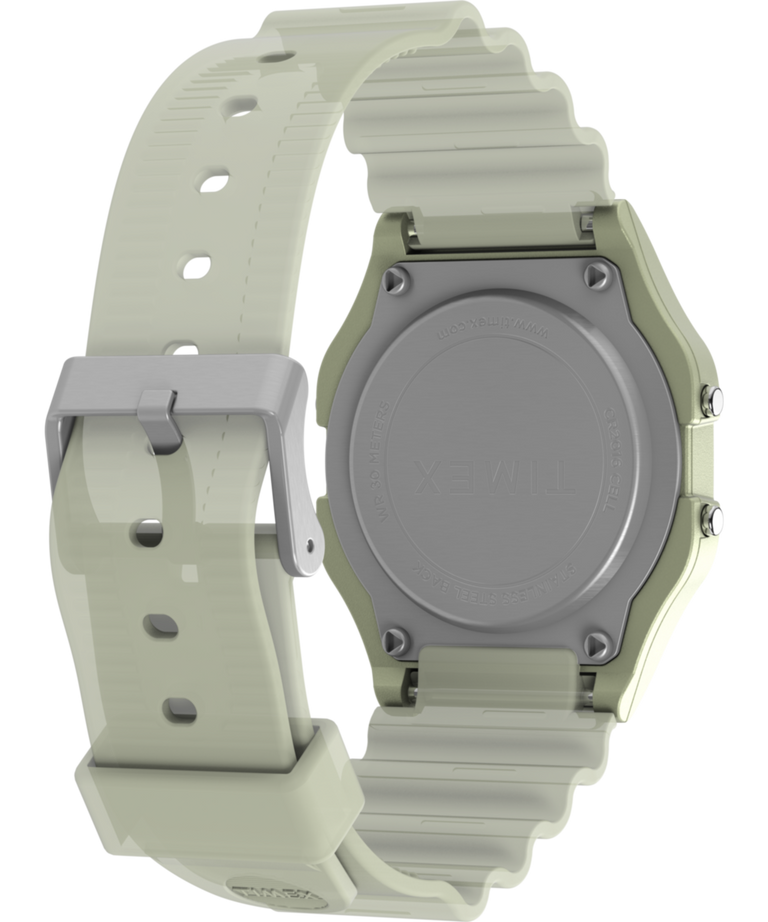 TW2Y02600 Reloj Timex T80 que brilla en la oscuridad, de 34 mm, con correa de resina: imagen del fondo de la caja con accesorio