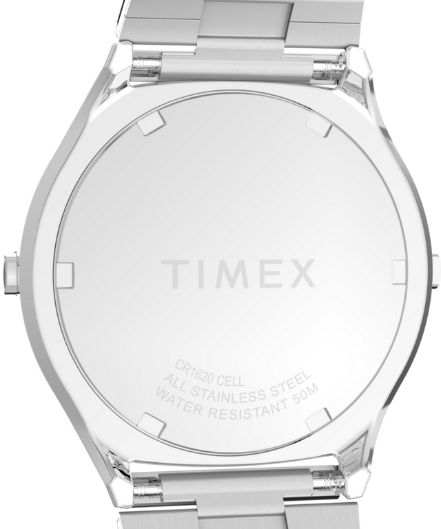 TW2Y06100 Q Timex® 1975 SSQ Edición digital reeditada. Reloj de 38 mm con brazalete de acero inoxidable. Imagen del fondo de la caja