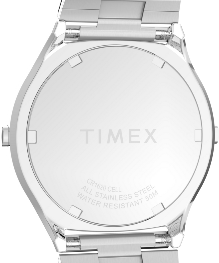 TW2Y06100 Q Timex® 1975 SSQ Edición digital reeditada. Reloj de 38 mm con brazalete de acero inoxidable. Imagen del fondo de la caja