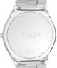TW2Y06100 Q Timex® 1975 SSQ Edición digital reeditada. Reloj de 38 mm con brazalete de acero inoxidable. Imagen del fondo de la caja
