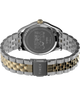 TW2Y11100 Peanuts® x Timex Legacy Bowtie, reloj de 34 mm con brazalete de acero inoxidable; imagen del fondo de la caja con accesorio