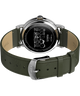 TW2Y12400 Peanuts® x Timex Weekender, esfera festiva, 40 mm, correa de piel. Imagen del fondo de la caja con accesorio.