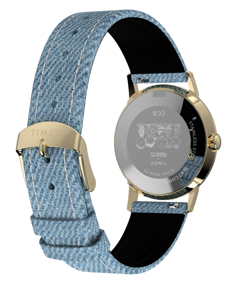 Imagen del fondo de caja con accesorio del reloj TW2Y12500 Peanuts® x Timex Marlin® 1965 Reissue inspirado en Snoopy Tennis con correa de tela de 34 mm
