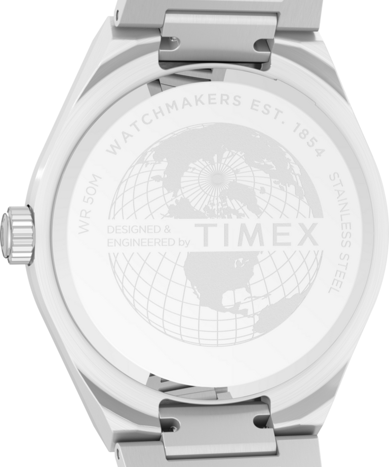 TW2Y25000 Q Timex® Continental Día y fecha, reloj de 39 mm con brazalete de acero inoxidable. Imagen del fondo de la caja