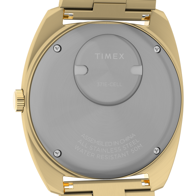 TW2Y34400 Q Timex® 1975 Enigma, reloj de 37 mm con brazalete de acero inoxidable. Imagen del fondo de la caja.