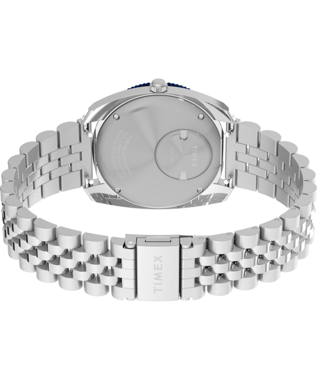 TW2Y44400 Q Timex® 1971 Velocity, reloj de 36 mm con brazalete de acero inoxidable: imagen del fondo de la caja con accesorio