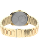 TW2Y45200 Q Timex® 1972 Time Machine Reissue, reloj de 39 mm con brazalete de acero inoxidable. Imagen del fondo de la caja con accesorio.