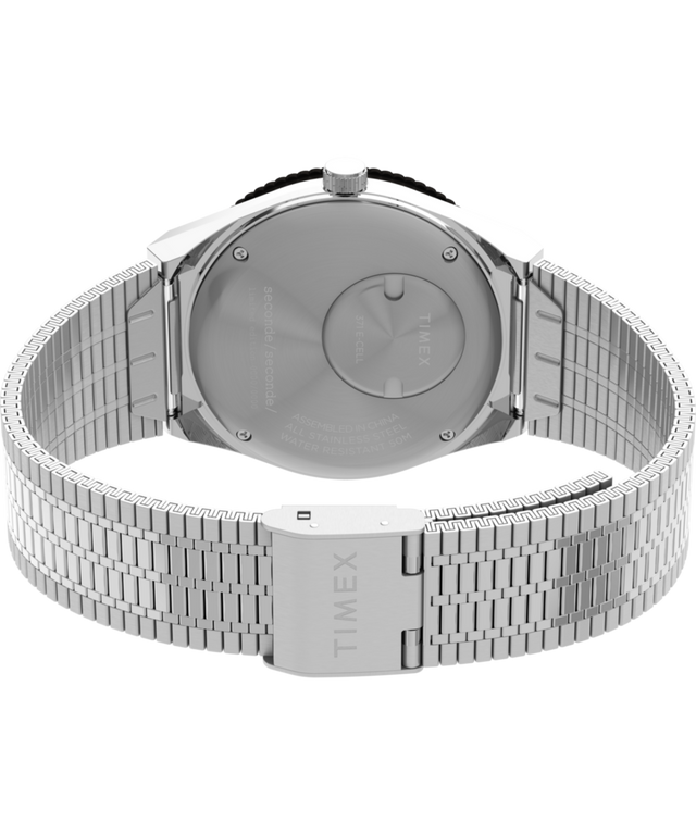 TW2Y48100 Timex x seconde/seconde/ Reloj de 38 mm con brazalete de acero inoxidable. Imagen del fondo de la caja con accesorio.