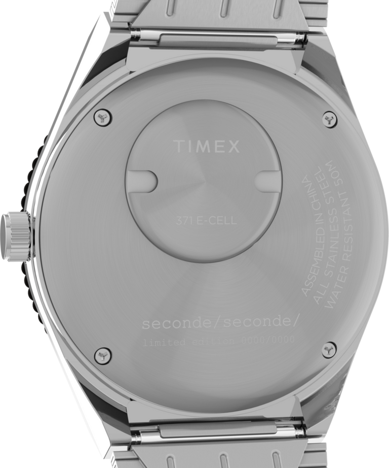 TW2Y48200 Timex x seconde/seconde/ Reloj de 38 mm con brazalete de acero inoxidable. Imagen del fondo de la caja.