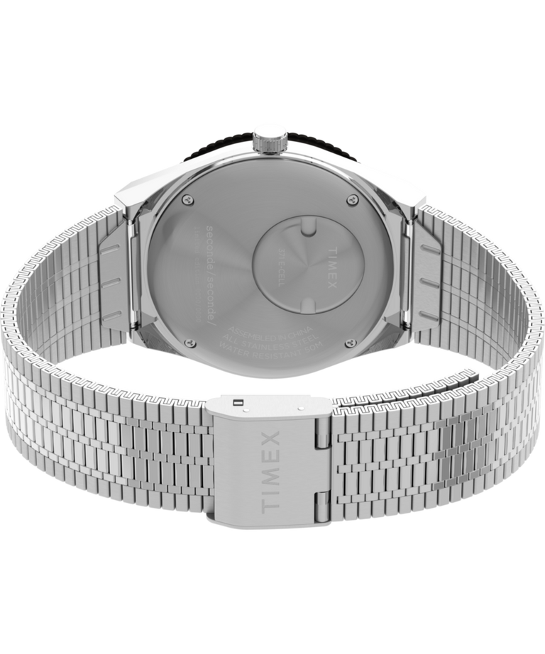 TW2Y48200 Timex x seconde/seconde/ Reloj de 38 mm con brazalete de acero inoxidable. Imagen del fondo de la caja con accesorio