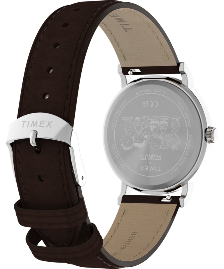 TW2Y51500 Reloj Peanuts® x Timex Weekender Baseball de 38 mm con correa de piel  Imagen del fondo de la caja con accesorio