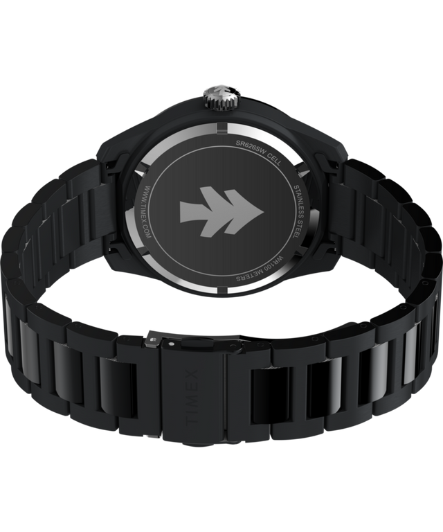 TW2Y53200 Huckberry x Timex 1979 Black Max, reloj de 41 mm con brazalete de acero inoxidable. Imagen del fondo de la caja con accesorio.