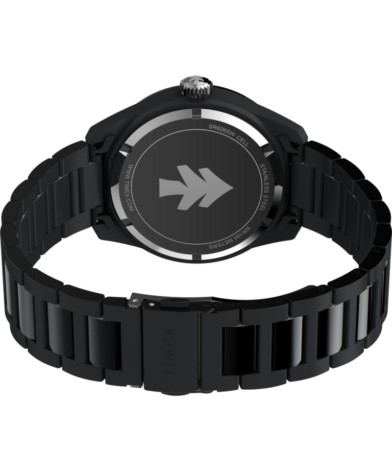 TW2Y53200 Huckberry x Timex 1979 Black Max, reloj de 41 mm con brazalete de acero inoxidable. Imagen del fondo de la caja con accesorio.