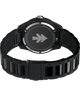 TW2Y53200 Huckberry x Timex 1979 Black Max, reloj de 41 mm con brazalete de acero inoxidable. Imagen del fondo de la caja con accesorio.