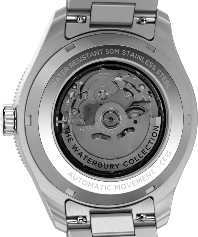 TW2Y60800 Waterbury Heritage Automático GMT, 41,5 mm, acero inoxidable, brazalete. Imagen del fondo de la caja del reloj