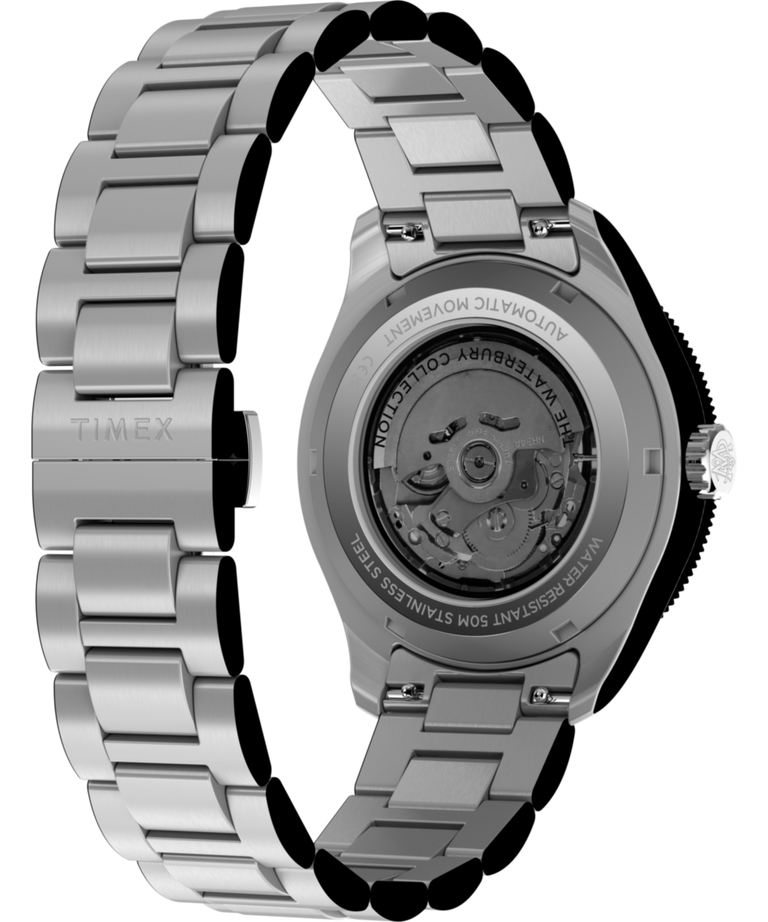 TW2Y60800 Waterbury Heritage Automático GMT, 41,5 mm, acero inoxidable, brazalete; imagen del fondo de la caja con accesorio