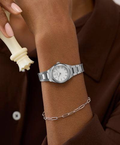 TW2Y68500 Q Timex® Continental Mini 24mm Stainless Steel Bracelet Watch Alt Wrist Shot 1 Image