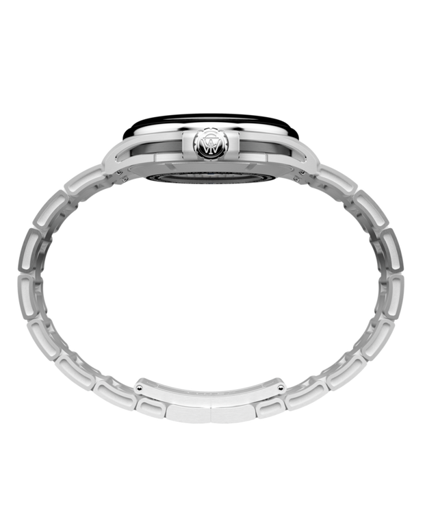 TW2Y72300 Timex Atelier GMT24 M1a 40 mm, fabricado en Suiza, automático, con brazalete de acero inoxidable. Imagen de perfil