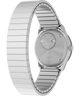 TW2Y77300 Q Reloj Timex® Mini de 30 mm con correa extensible de acero inoxidable. Imagen del fondo de la caja con accesorio.