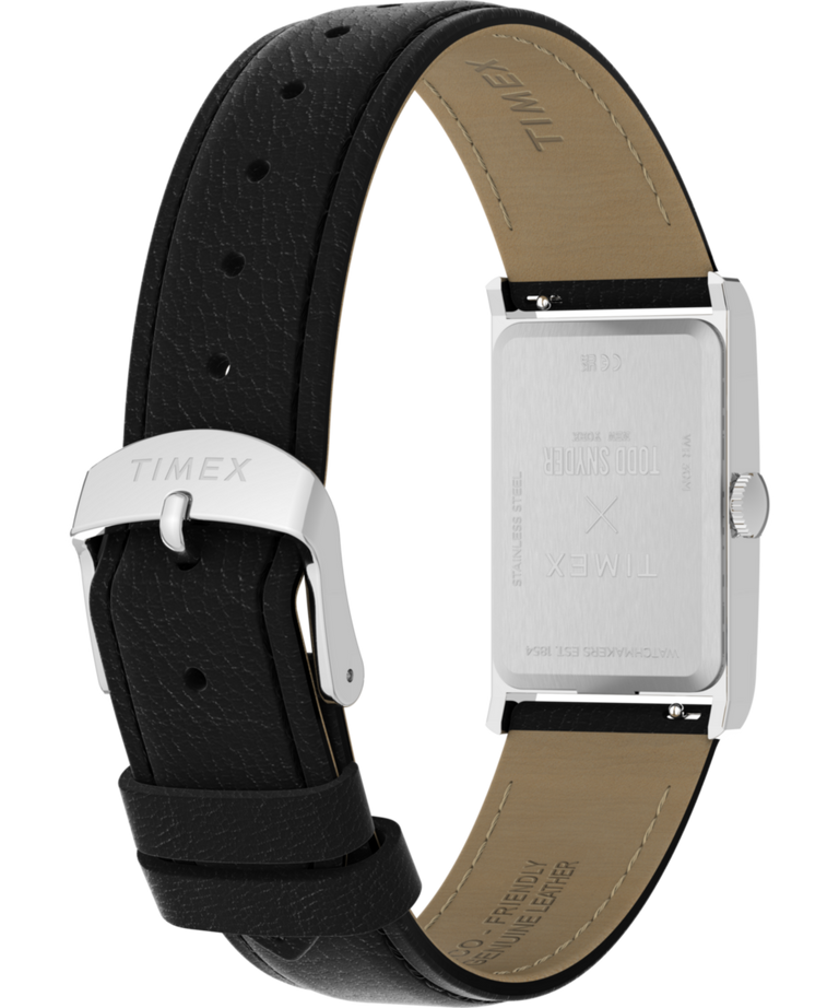 TW2Y78800 Todd Snyder x Timex 1976 Lexington, reloj con correa de piel de 21 mm. Imagen del fondo de la caja con accesorio.