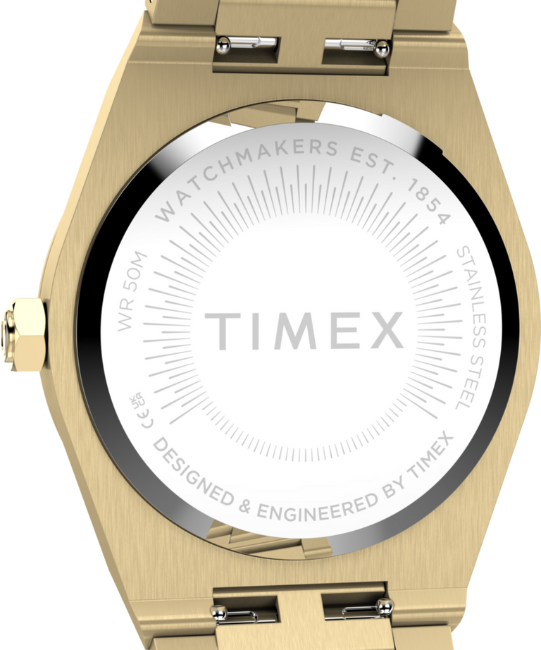 TW2Y82000 Q Timex Marbella, reloj de 34 mm con brazalete de acero inoxidable. Imagen del fondo de la caja.