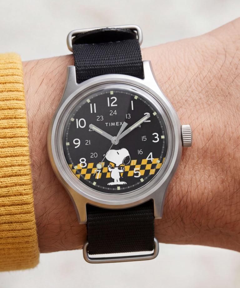 TW2Y85400 Reloj Peanuts® x Timex MK1® de 36 mm con correa de tela. Imagen principal de la muñeca