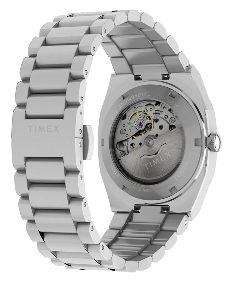 TW6A00500 Reloj Timex® Automatic E Line de 38 mm con brazalete de acero inoxidable. Imagen del fondo de la caja con accesorio.
