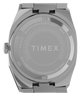 TW6A01000 Timex® Quartz E Line, reloj de 30 mm con brazalete de acero inoxidable. Imagen del fondo de la caja.