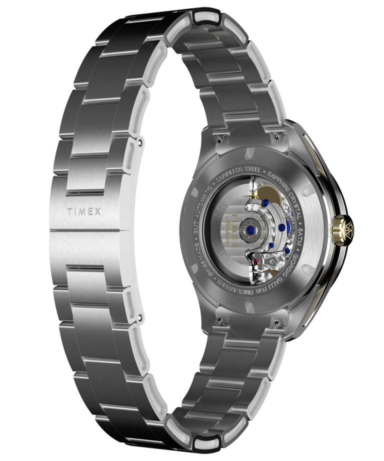 TW6A07200 Timex Atelier GMT Première M1a, 38 mm, fabricado en Suiza, automático, brazalete de acero inoxidable, imagen del fondo de la caja con accesorio