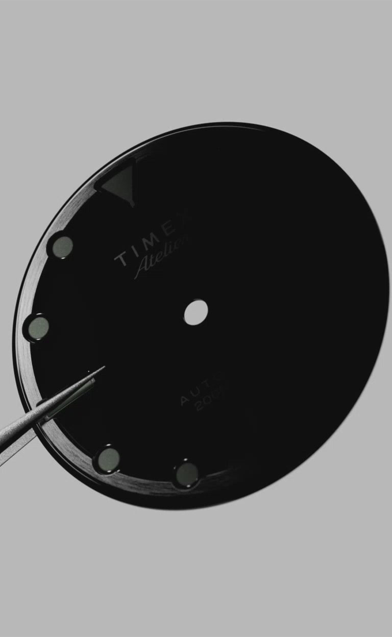 A promotional video of the Timex Atelier collection, featuring slow-motion details of the automatic movement, brushed steel bracelet, and luminous indices glowing in the dark. The film blends design sketches, watch assembly sequences, and rotating product shots, underscoring the luxury engineering, precision, and timeless design of the Timex Atelier series.
