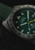 Video showcasing Timex Expedition Pioneer Titanium Automatic GMT watch, highlighting green dial, lume, titanium case, and outdoor durability.
