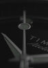 A cinematic showcase of the Timex Atelier automatic dive watch. The video highlights close-up details of the polished stainless steel case, rotating bezel, and black dial with luminous markers. The camera pans across the brushed metal bracelet, the engraved crown with the Timex “T” logo, and the transparent caseback revealing the Swiss automatic movement.